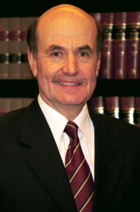 Headshot of Daniel Ish.